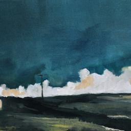 House in the rolling hills and low clouds