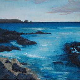 Shoreline with rocks and blue sea